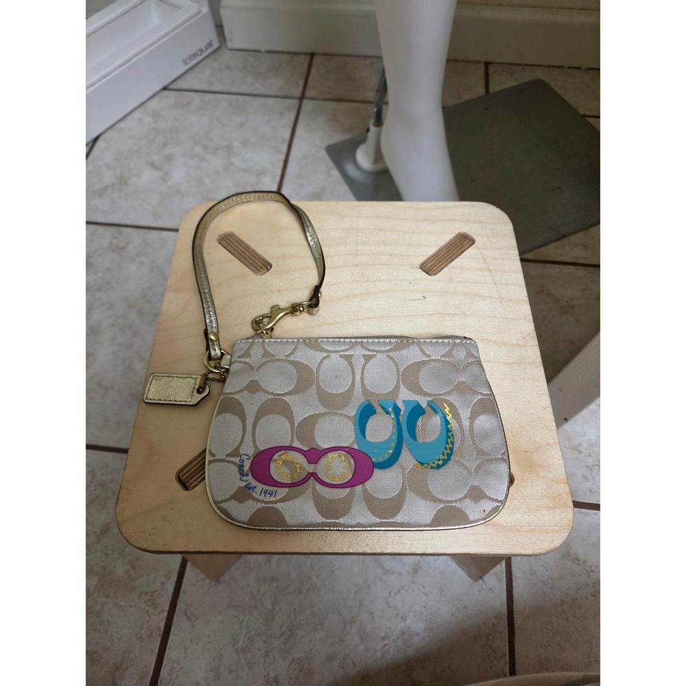 yk2 Coach Signature Khaki Gold Canvas Wristlet Colorful Graphic Logo 42931